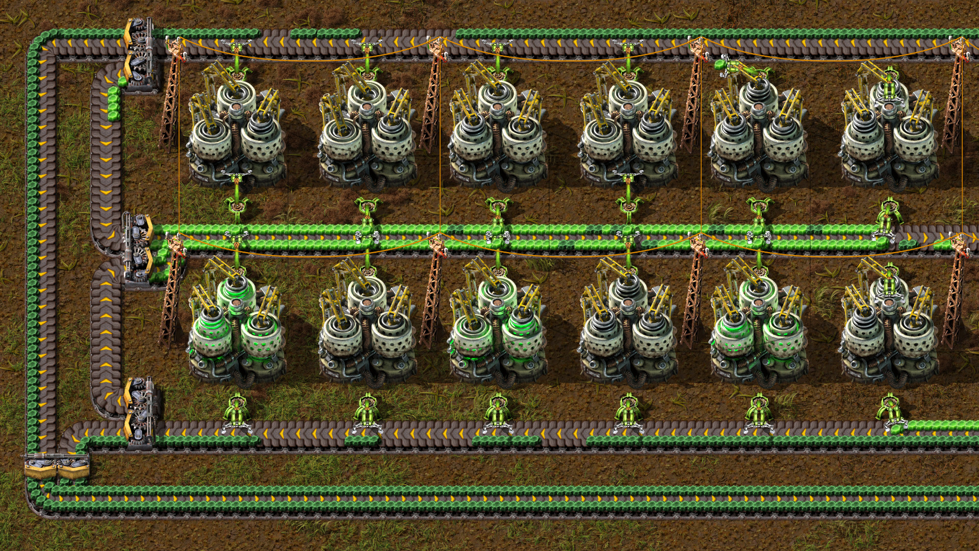 Factorio: два ряда лабораторий окружены конвейерами с исследовательскими пакетами