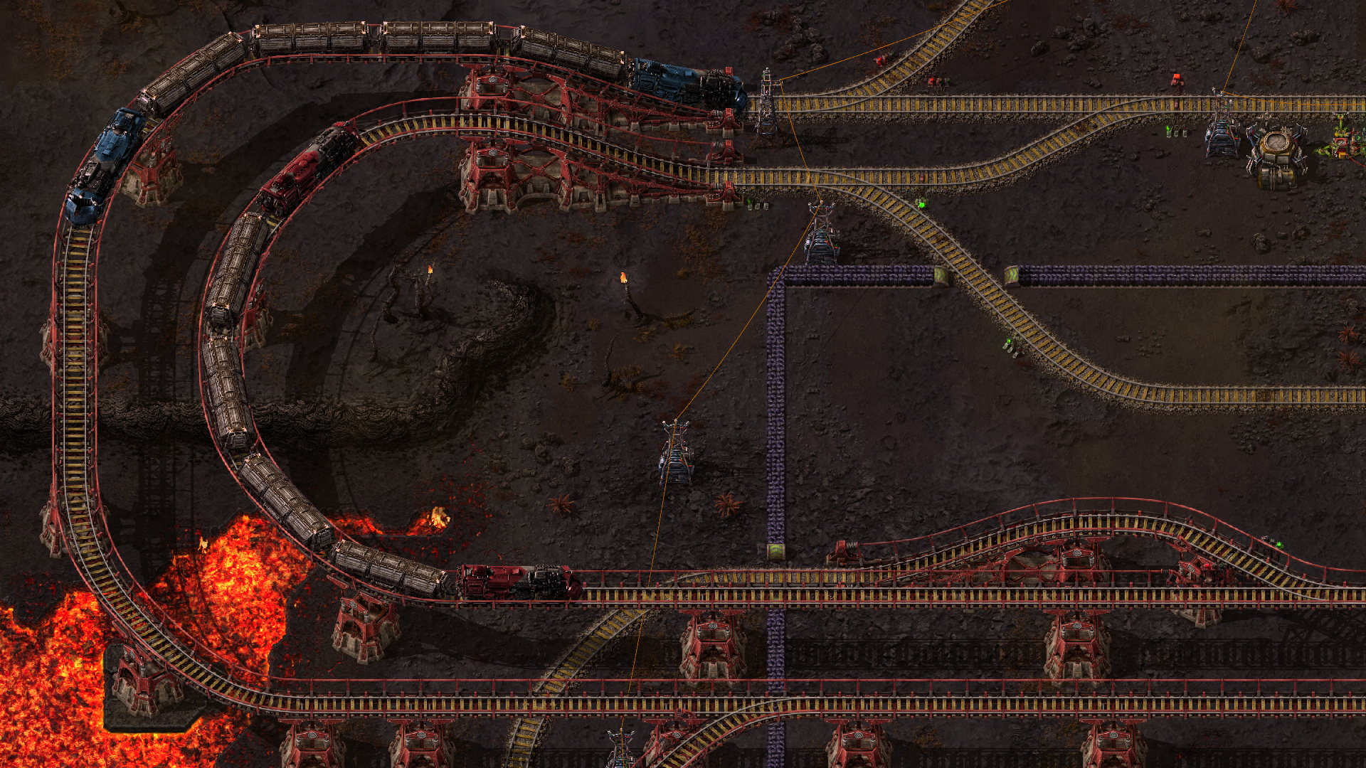 Factorio Space Age: железнодорожные пути над тёмной вулканической поверхностью рядом с лавой